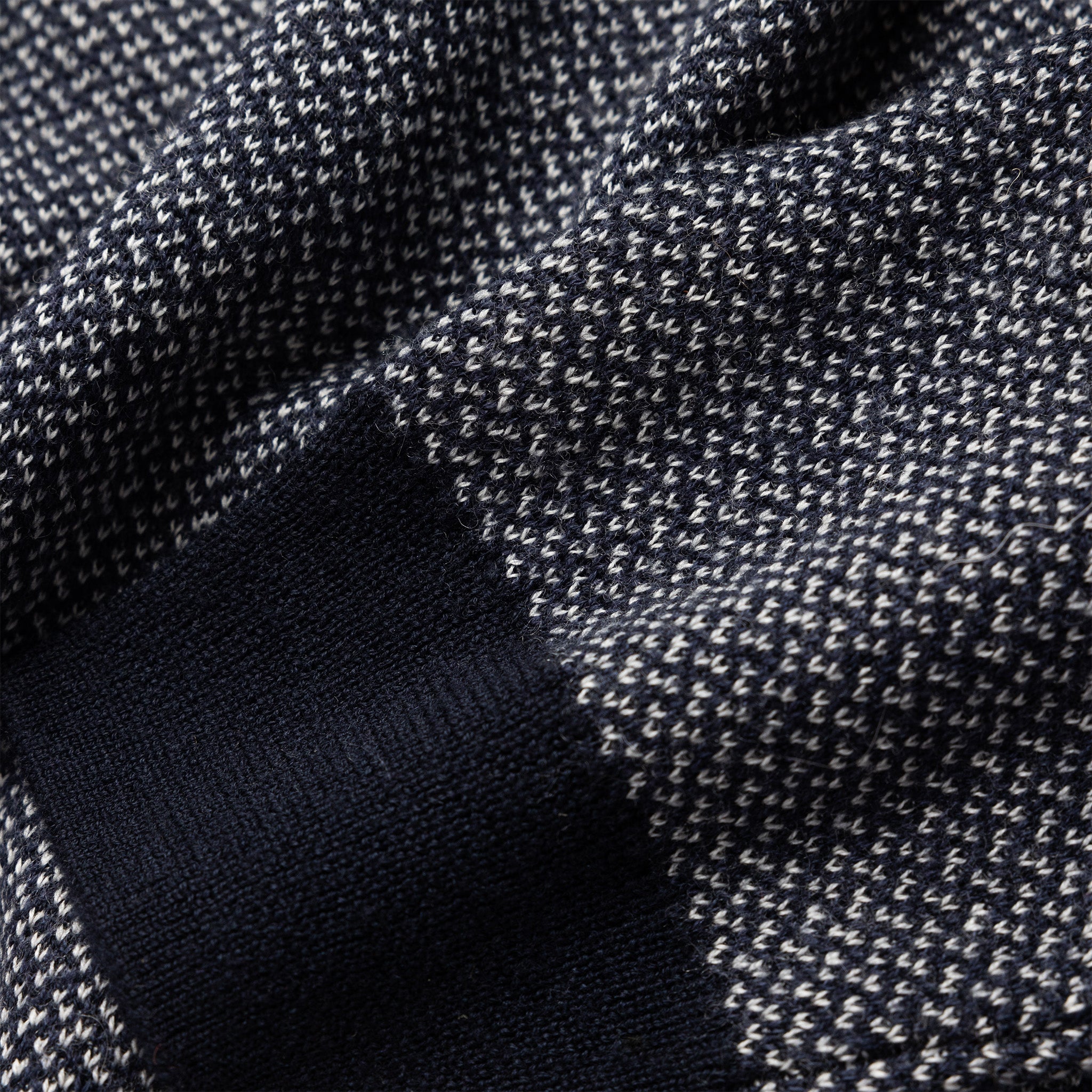 material shot of the texture on The Everett Sweater in Navy Birdseye, Knits by Taylor Stitch