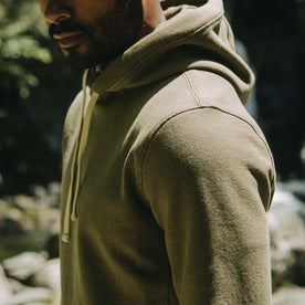 fit model showing the side of The Fillmore Hoodie in Cypress Terry