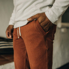 fit model standing in The Fillmore Pant in Copper Terry