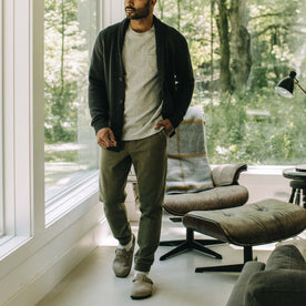 fit model walking in The Fillmore Pant in Cypress Terry