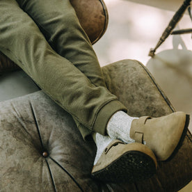 fit model with his feet up in The Fillmore Pant in Cypress Terry