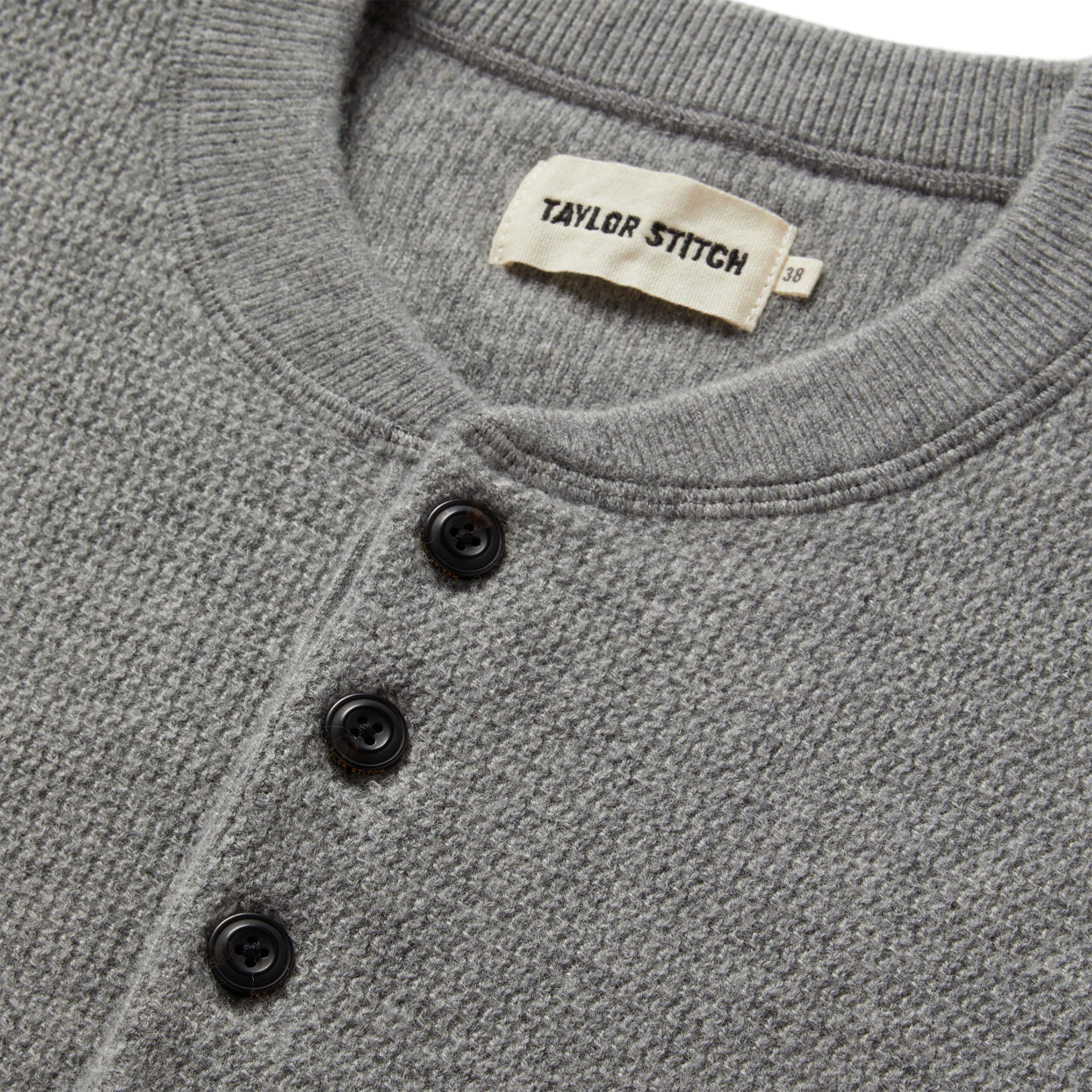 material shot of the buttons on The Hudson Sweater in Heather Grey, Knits by Taylor Stitch