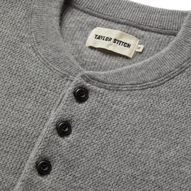 material shot of the buttons on The Hudson Sweater in Heather Grey