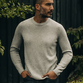 fit model posing in The Lodge Sweater in Heather Grey