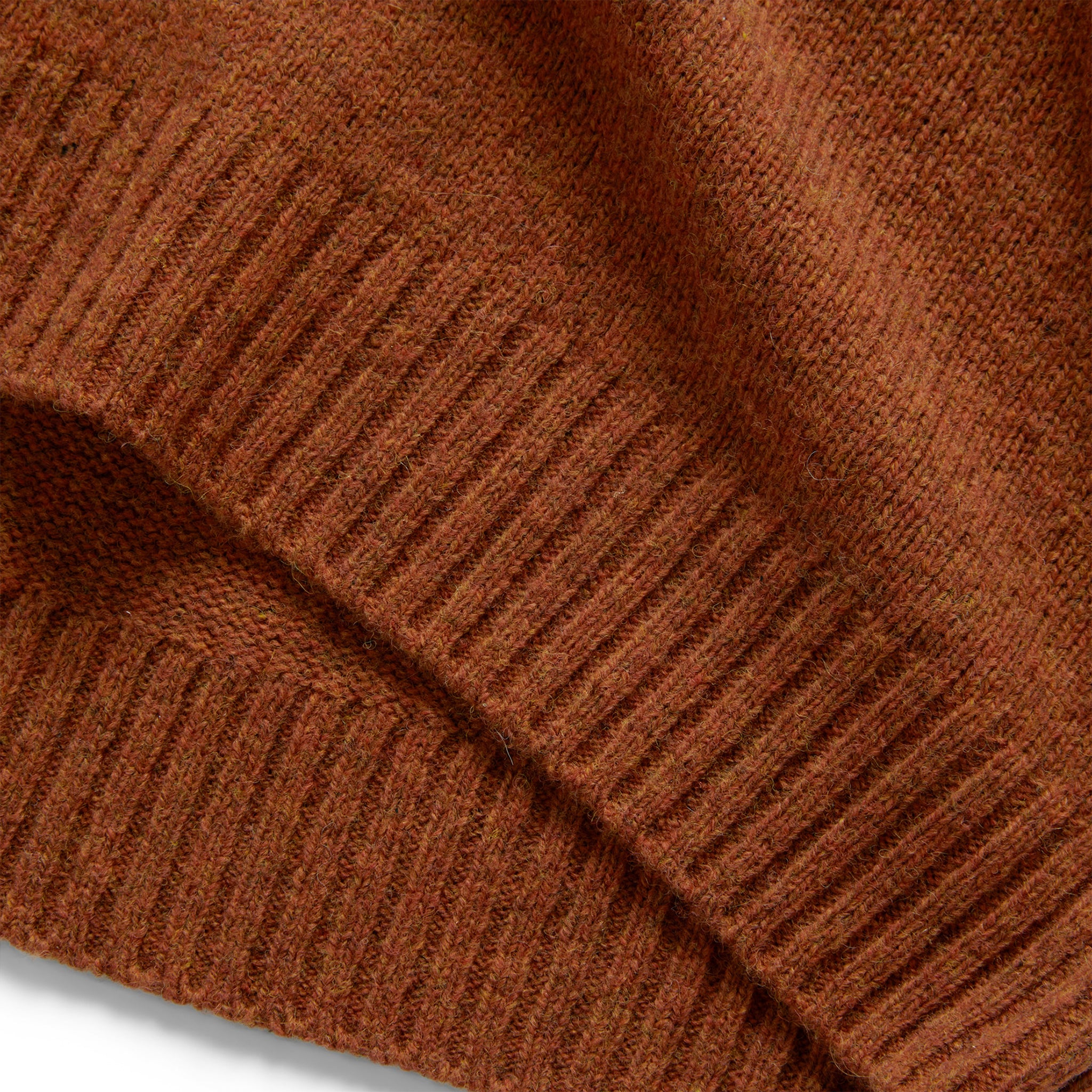 material shot of the hem on The Lodge Sweater in Rust, Knits by Taylor Stitch