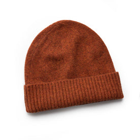 flatlay of The Lodge Beanie in Rust