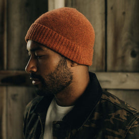 fit model wearing The Lodge Beanie in Rust
