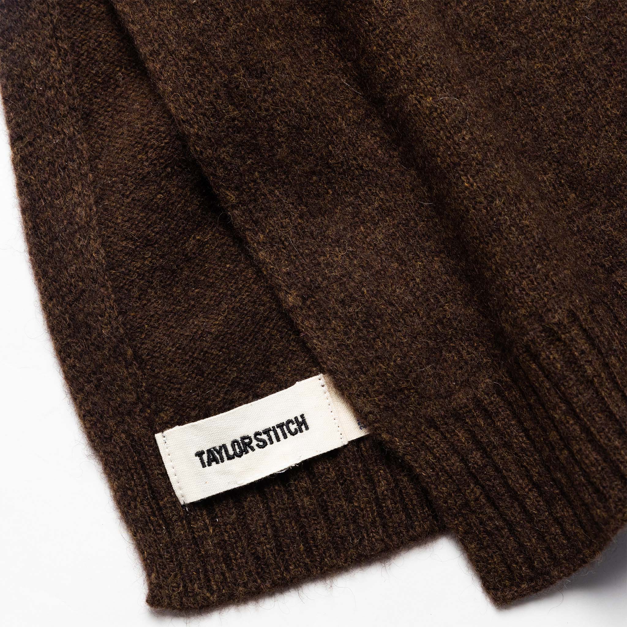 material shot of the label on The Lodge Scarf in Coffee, Accessories by Taylor Stitch