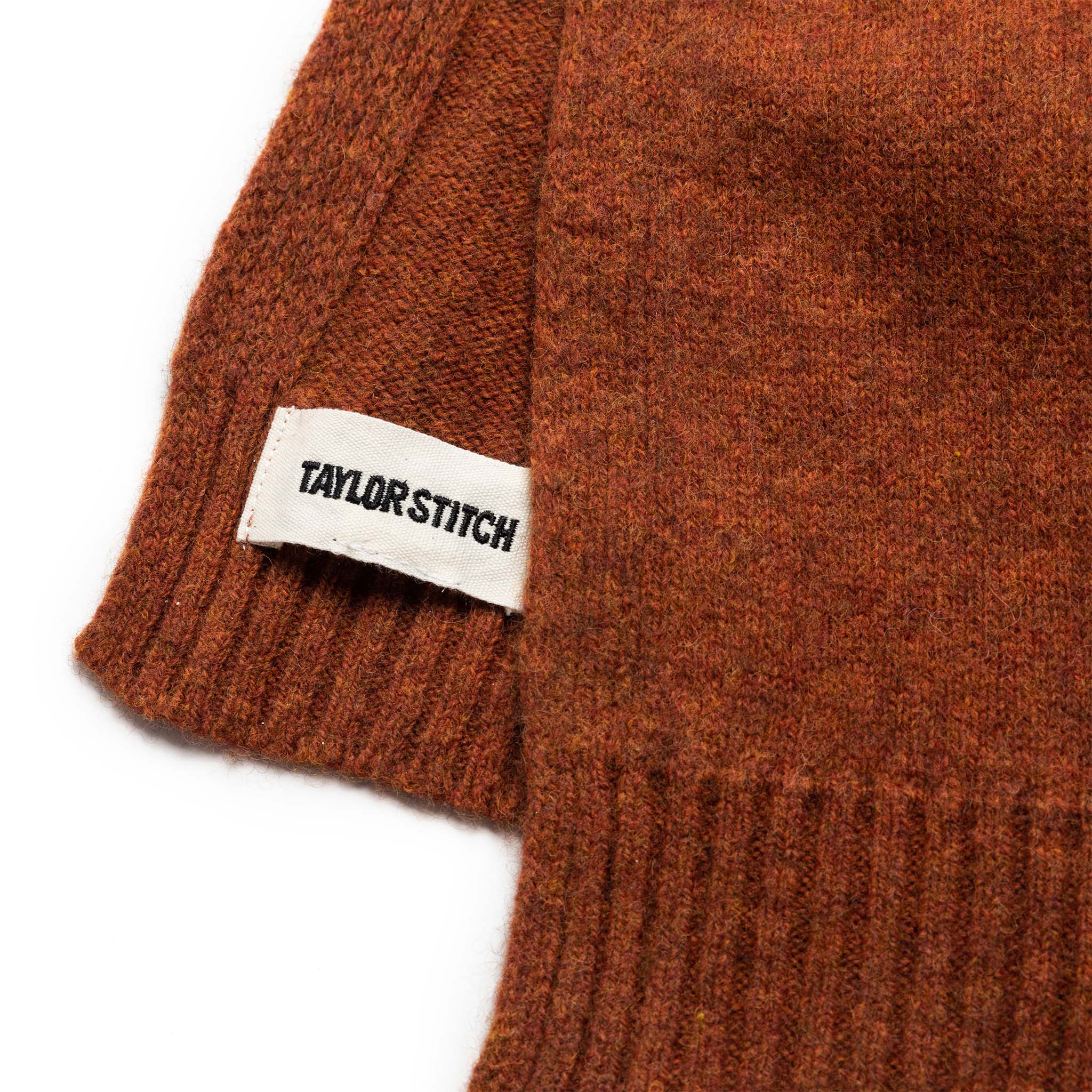 material shot of the label on The Lodge Scarf in Rust, Accessories by Taylor Stitch