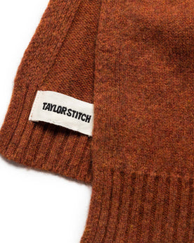 material shot of the label on The Lodge Scarf in Rust, Accessories by Taylor Stitch