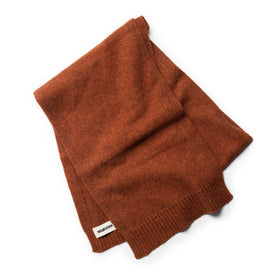 flatlay of The Lodge Scarf in Rust, shown folded