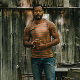 fit model standing in The Organic Cotton Tee in Sahara Stripe