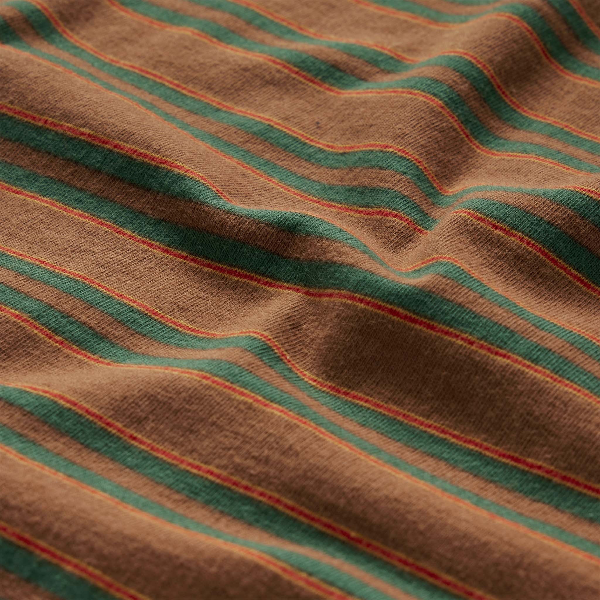 material shot of the stripes on The Organic Cotton Tee in Sahara Stripe, Knits by Taylor Stitch