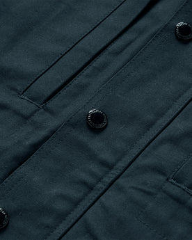 material shot of the buttons on The Pathfinder Jacket in Navy Dry Wax, Outerwear by Taylor Stitch