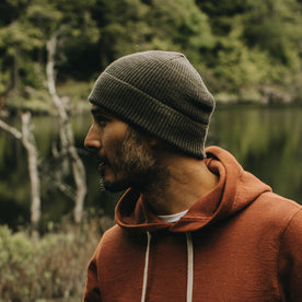 fit model showing the side of The Rib Beanie in Heather Forest