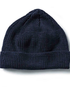 flatlay of The Rib Beanie in Heather Navy, Accessories by Taylor Stitch