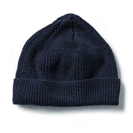 flatlay of The Rib Beanie in Heather Navy