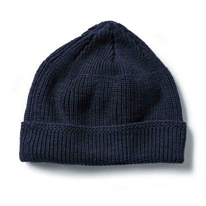 flatlay of The Rib Beanie in Heather Navy