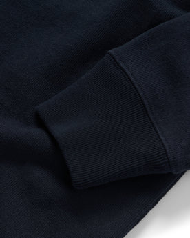 material shot of the ribbed cuffs on The Rugby Shirt in Dark Navy, Knits by Taylor Stitch