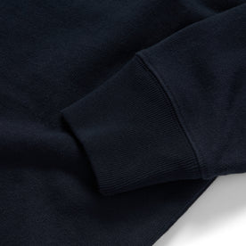 material shot of the ribbed cuffs on The Rugby Shirt in Dark Navy