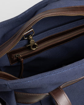 material shot of the interior zipper pocket of The Utility Bag in Navy, Accessories by Taylor Stitch
