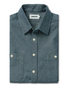 flatlay of The Utility Shirt in Rinsed Selvage Chambray folded, Wovens by Taylor Stitch