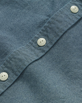 material shot of the buttons on The Utility Shirt in Rinsed Selvage Chambray, Wovens by Taylor Stitch