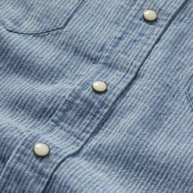 material shot of the buttons on The Western Shirt in Indigo Stripe