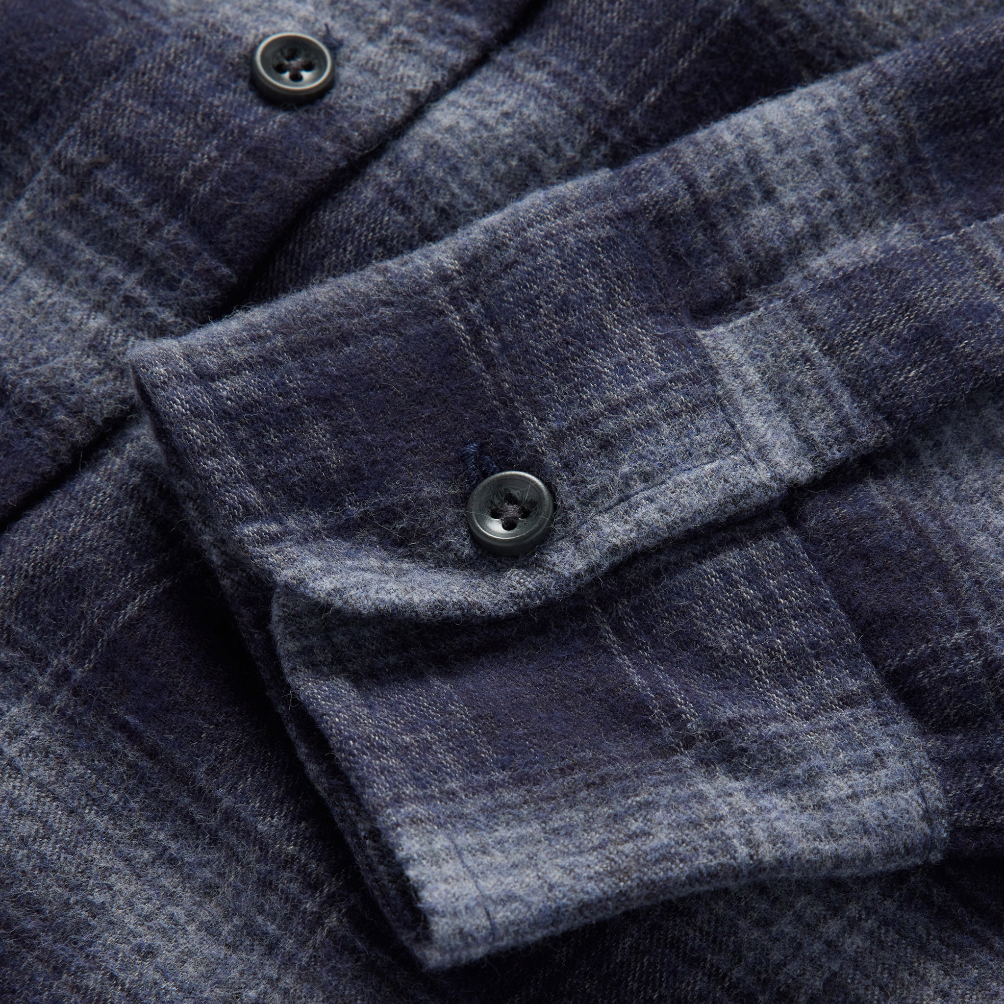 material shot of the cuff of The Yosemite Shirt in Navy Shadow Plaid, Wovens by Taylor Stitch