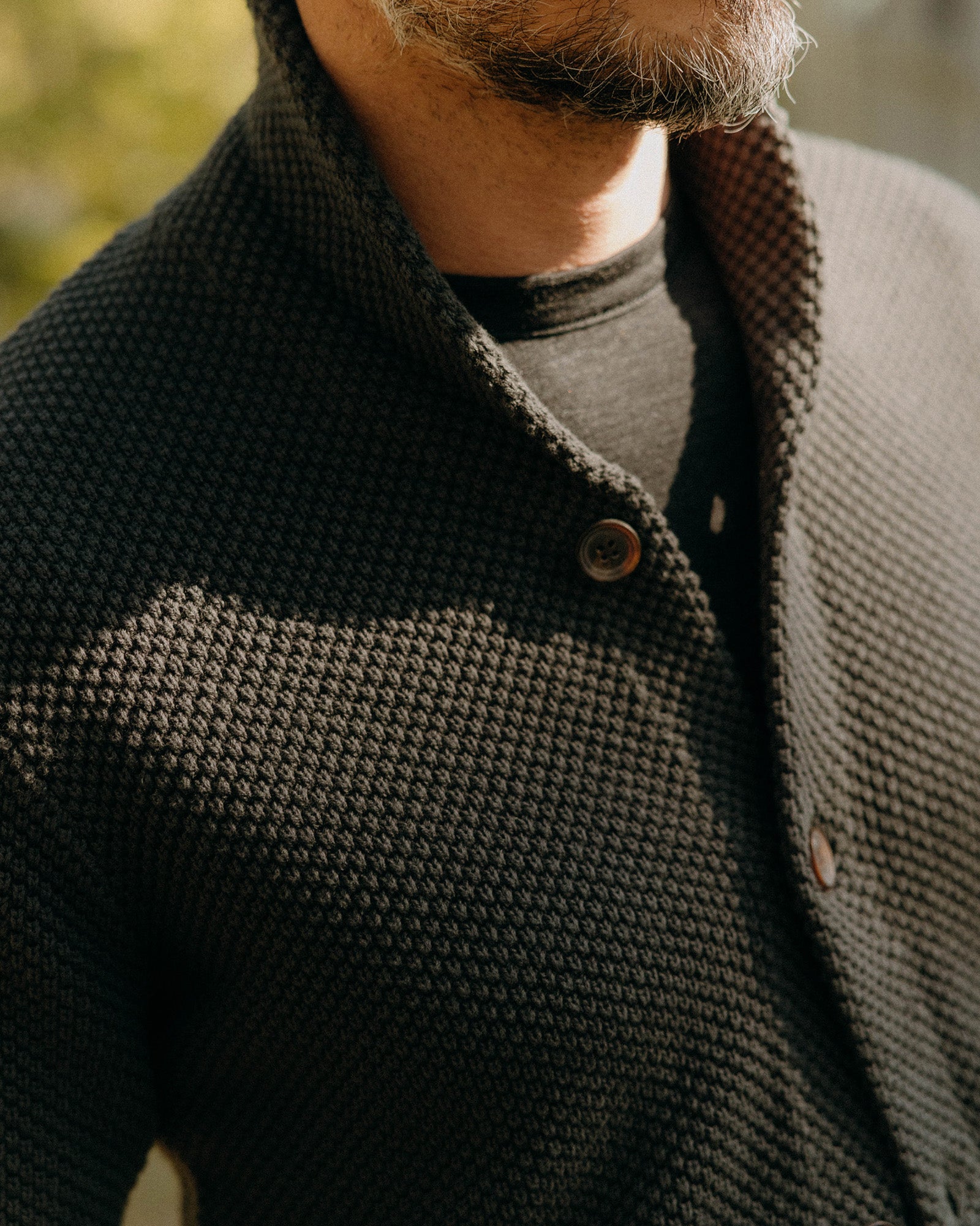 fit model wearing The Crawford Sweater in Charcoal, Knits by Taylor Stitch