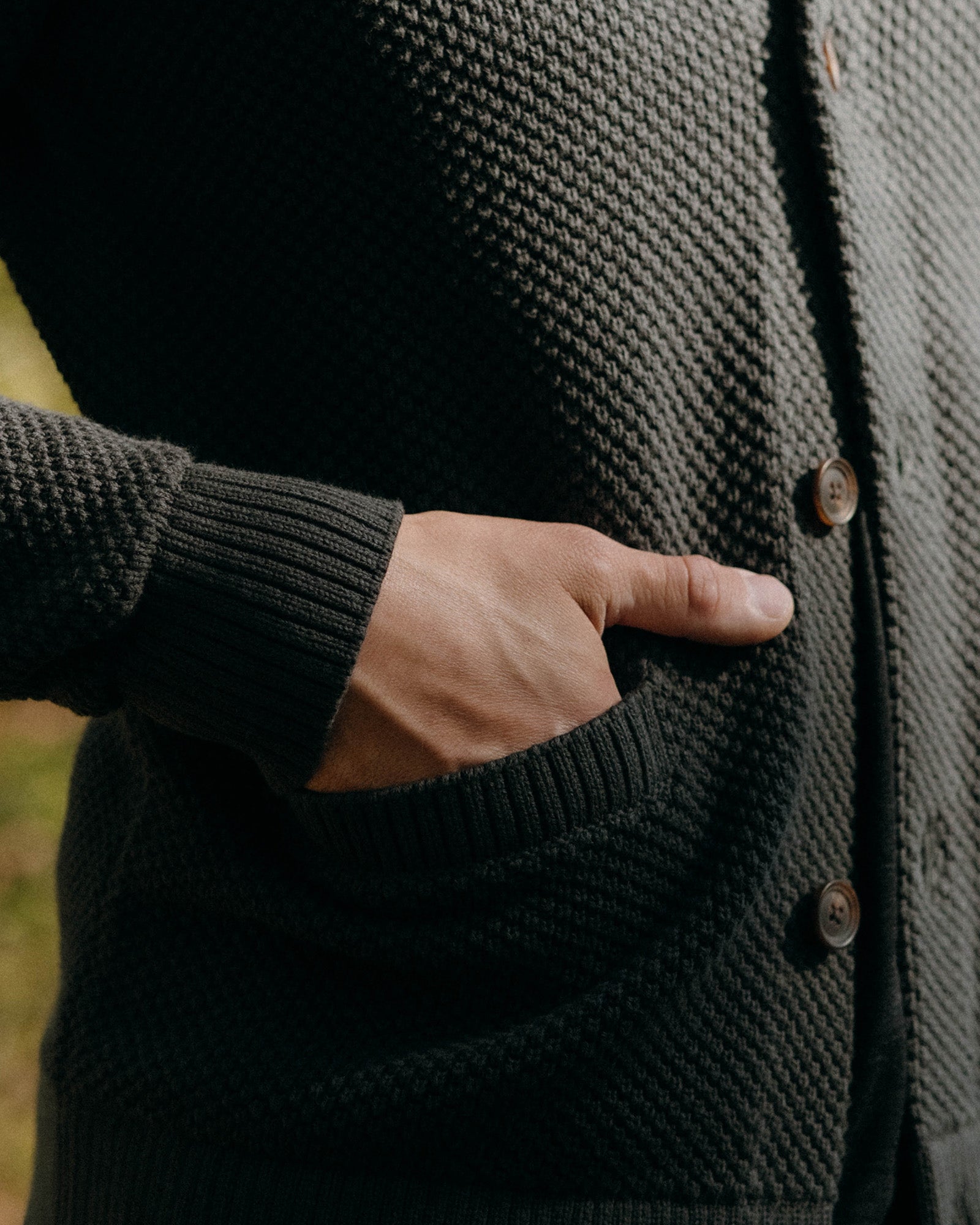 fit model walking in The Crawford Sweater in Charcoal, Knits by Taylor Stitch