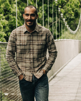 fit model walking in The Ledge Shirt in Fossil Plaid