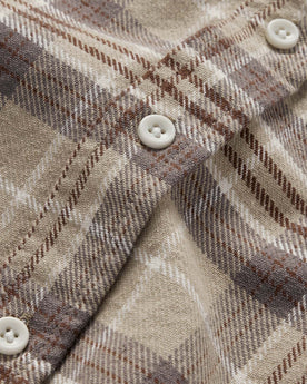 material shot of the buttons on The Ledge Shirt in Fossil Plaid, Wovens by Taylor Stitch