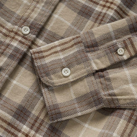 material shot of the sleeve cuff on The Ledge Shirt in Fossil Plaid