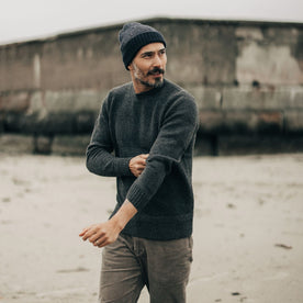 fit model adjusting sleeves in The Ventana Sweater in Heather Graphite