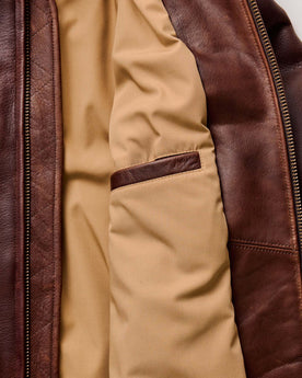 material shot of the zipper on The Moto Jacket in Espresso Steerhide, Outerwear by Taylor Stitch