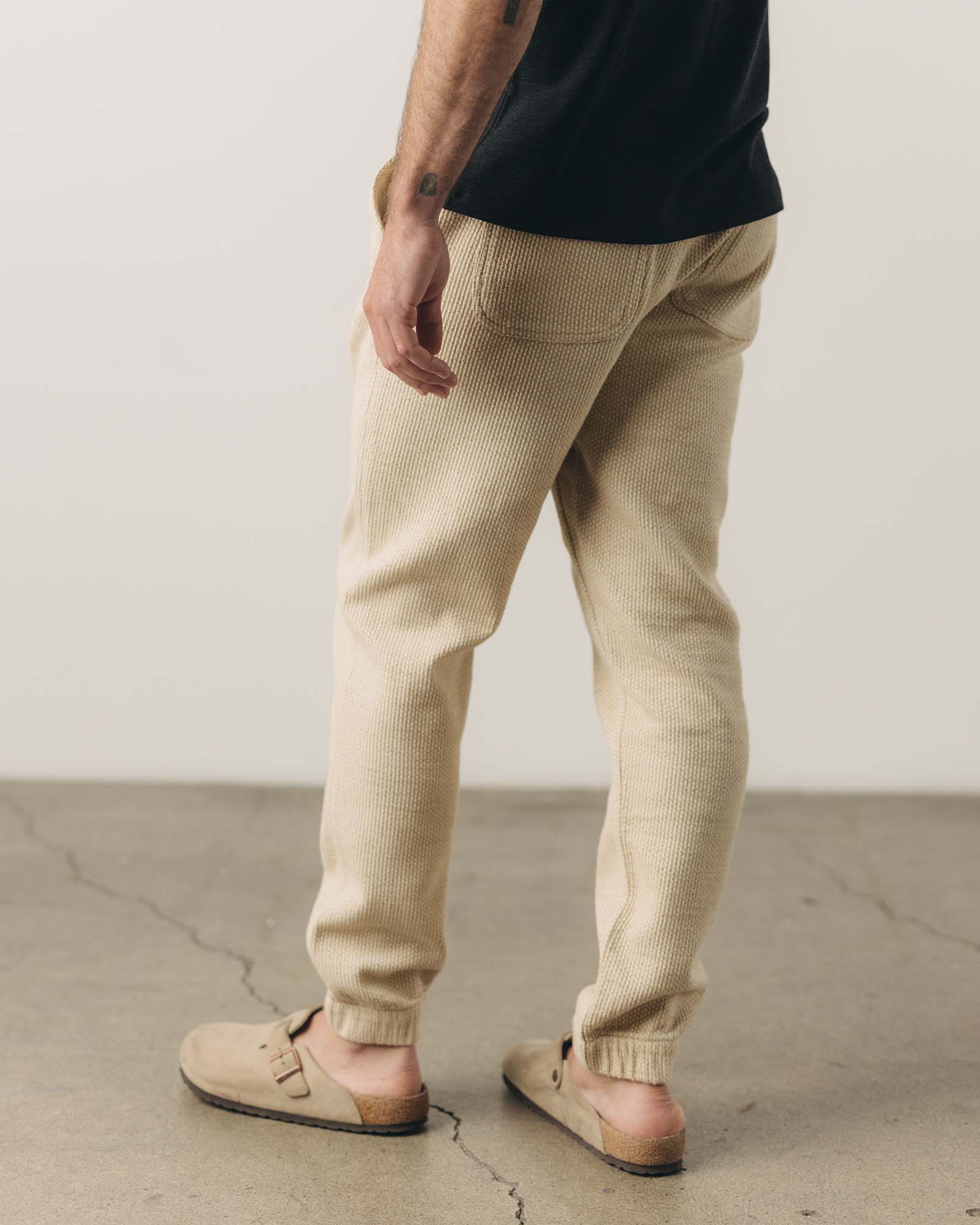 fit model showing the back of The Apres Pant in Natural Sashiko , Bottoms by Taylor Stitch