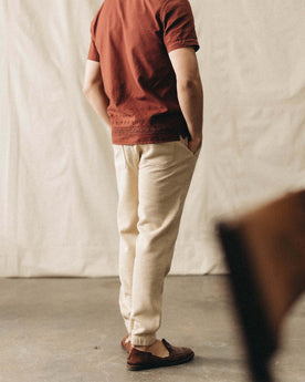 fit model showing the cuffs on The Apres Pant in Natural Sashiko , Bottoms by Taylor Stitch