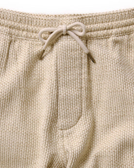 flatlay of the back of The Apres Pant in Natural Sashiko , Bottoms by Taylor Stitch