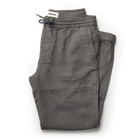 flatlay of The Apres Pant in Charcoal Double Cloth folded