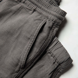 material shot of quarter top pocket of The Apres Pant in Charcoal Double Cloth