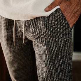 fit model wearing The Apres Pant in Charcoal Sashiko, up close shot
