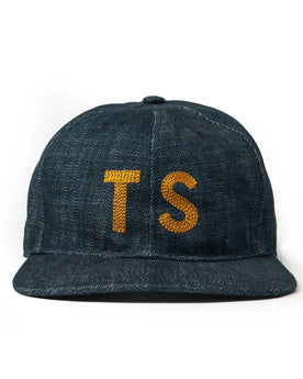 flatlay of The Ball Cap in Organic Denim, Accessories by Taylor Stitch