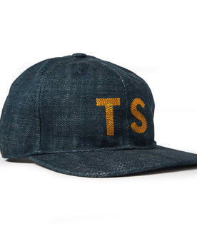 material shot of The Ball Cap in Organic Denim from the side, Accessories by Taylor Stitch