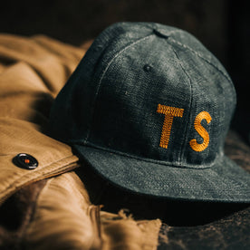 material shot of The Ball Cap in Organic Denim on a table