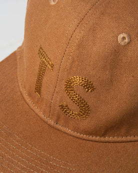 material shot of The Ball Cap in Tobacco Boss Duck showing TS, Accessories by Taylor Stitch
