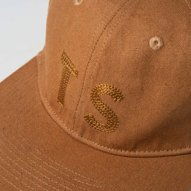 material shot of The Ball Cap in Tobacco Boss Duck showing TS