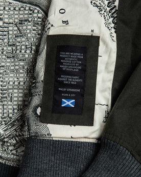 material shot of The Bomber Jacket in Waxed Olive with halley stevensons waxed label, Outerwear by Taylor Stitch