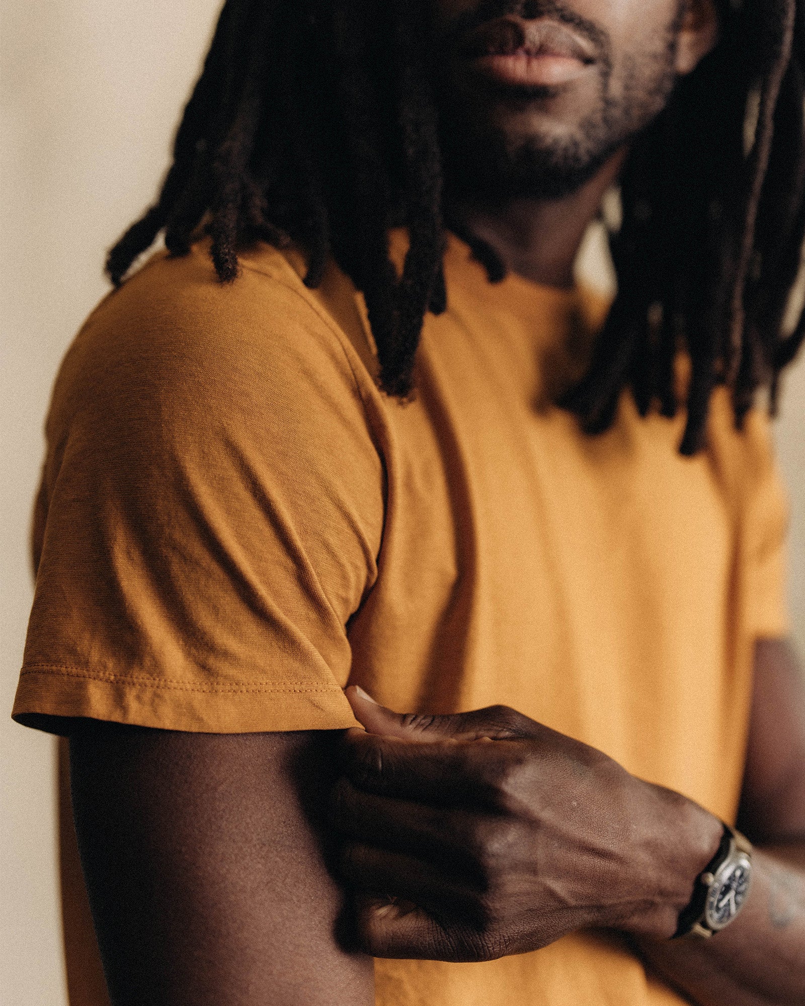 material shot of collar with interior printed label shown, Knits by Taylor Stitch