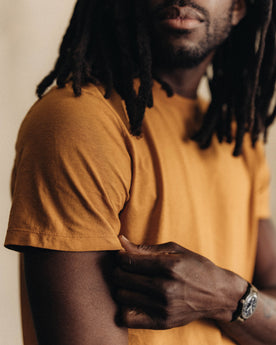 material shot of collar with interior printed label shown, Knits by Taylor Stitch